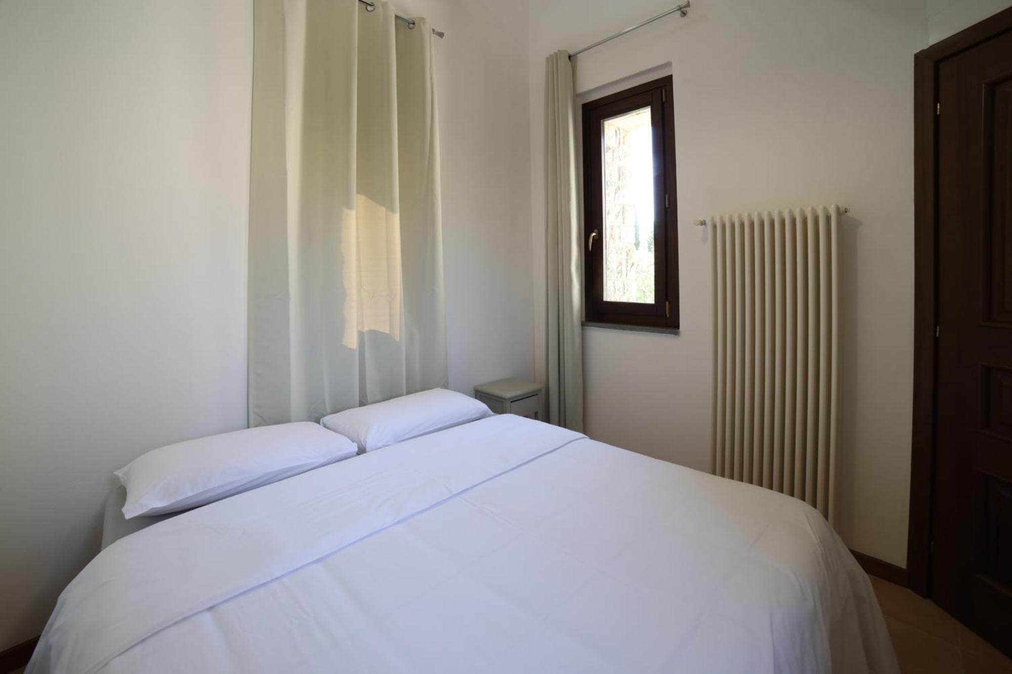 Aparthotel Ht Castello Di Campolongo Valfabbrica Exterior foto
