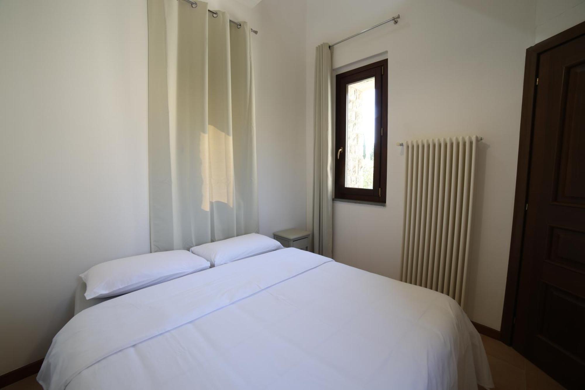 Aparthotel Ht Castello Di Campolongo Valfabbrica Exterior foto